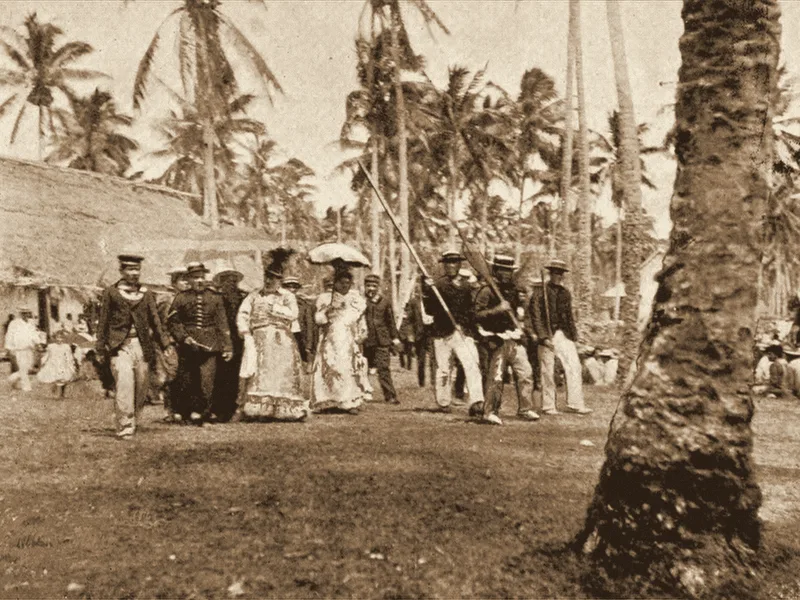 A procession in Niue, about 1900. Public domain.